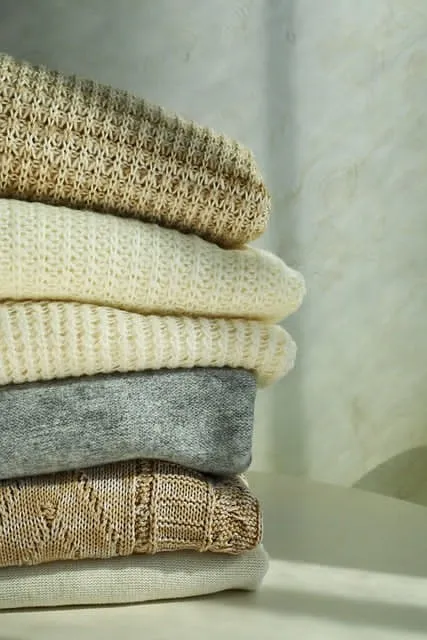 A pile of woolen blankets